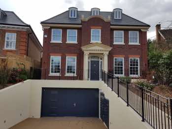 A new 4,000ft² house in Wimbledon for a private client which is currently under construction. This extensive house built over four floors comprises a basement with in indoor pool, cinema, gym etc. Ground floor living area and 5 bedrooms on the top two floors. Garden required extensive terracing and included the outdoor pool, pavilion with soft and hard landscaping. <br/><br/>MVW Consultancy acted as Quantity Surveyor.